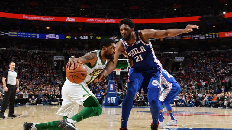 Kyrie Irving takes on Joel Embiid