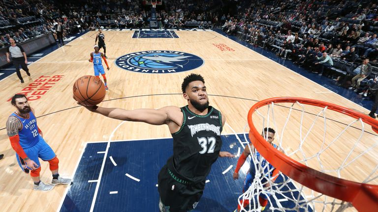 Karl-Anthony Towns throws down an emphatic dunk against Oklahoma City