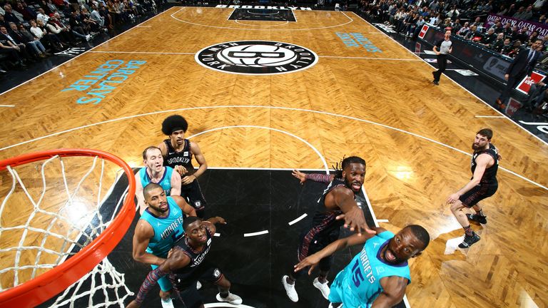 Kemba Walker attacks the basket against Brooklyn