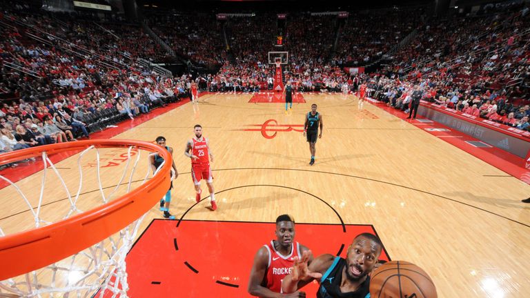 Kemba Walker attacks the basket against Houston