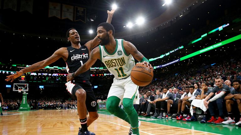 Kyrie Irving holds off Trevor Ariza