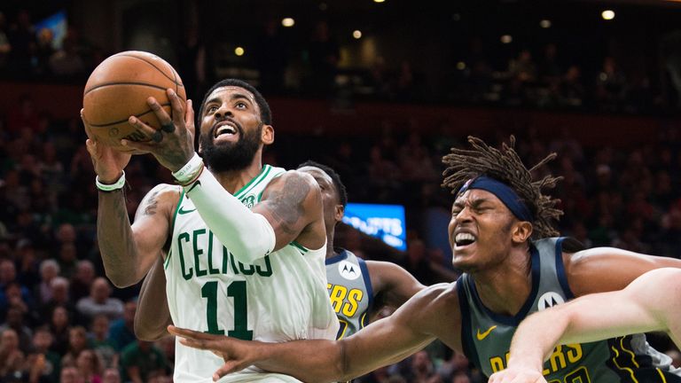 Kyrie Irving lofts a game-winning shot against Indiana
