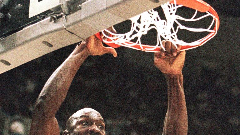 Michael Jordan throws down a two-handed dunk