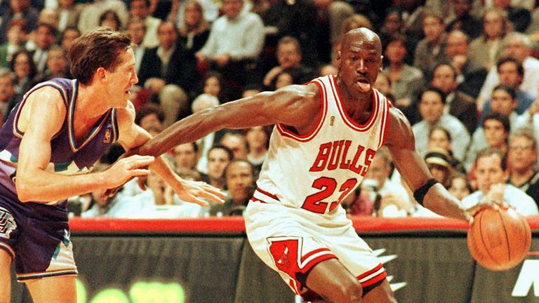 Michael Jordan drives at Jeff Hornacek in the 1997 NBA Finals