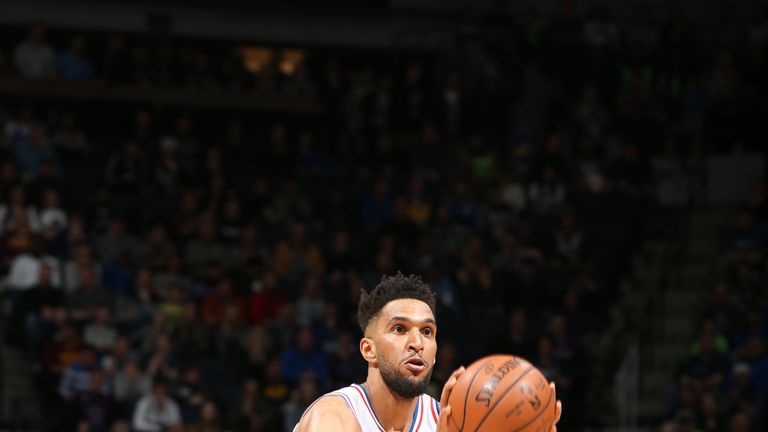 Jonah Bolden shoots a three against the Minnesota Timberwolves