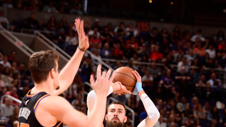 Jonas Valanciunas shoots a three-pointer against the Phoenix Suns