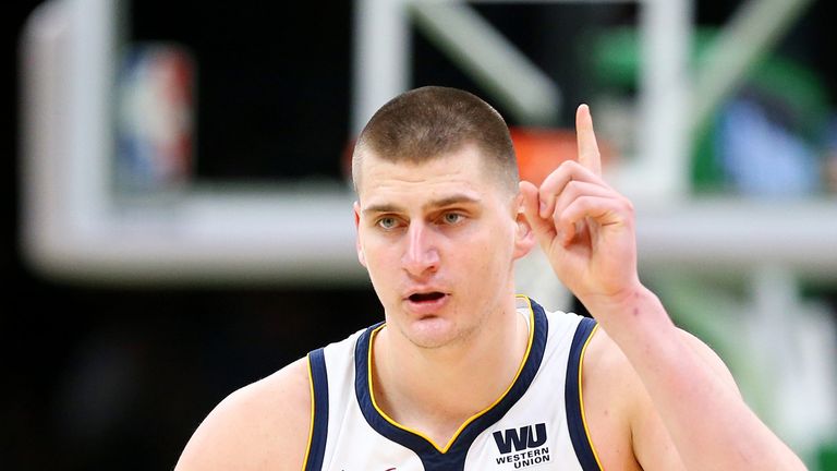 Nikola Jokic celebrates a basket during the Nuggets win in Boston