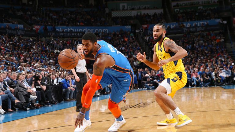 Paul George maintains his balance while attacking against Indiana