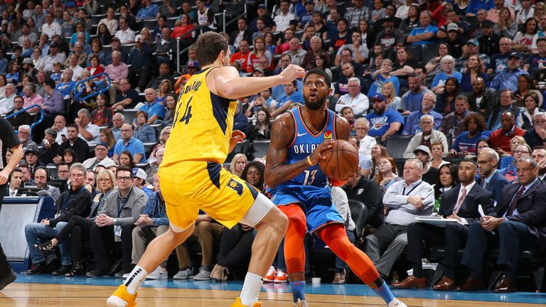 Paul George sets himself to shoot over Indiana&#39;s Bojan Bogdanovic