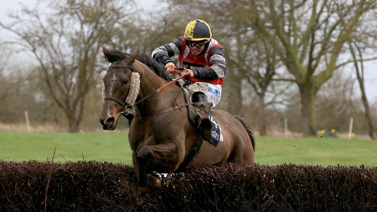 Potters Corner ridden by James Bowen clears the last hurdle and wins the Marstons 61 Deep Midlands Grand National race at Uttoxeter Racecourse.