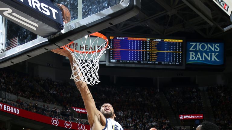 Rudy Gobert finishes at the rim against Phoenix