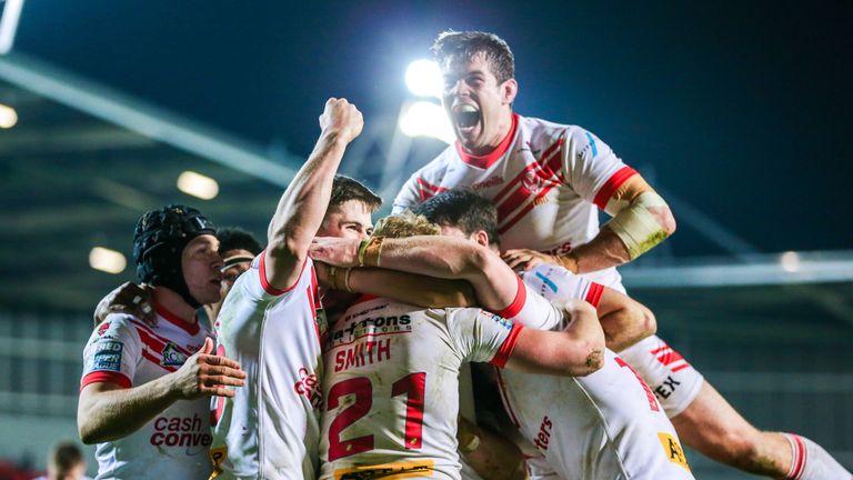 St Helens players celebrate Aaron Smith's try as Hull KR were beaten