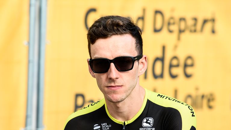 Adam Yates sits and waits before cycling onto the podium. during the team presentations in Place Napoleon, La Roche-Sur-Lyon, France. PRESS ASSOCIATION Photo. Picture date: Thursday July 5, 2018. See PA story CYCLING Tour. Photo credit should read: PA Wire. RESTRICTIONS: Editorial use only, no commercial use without prior permission
