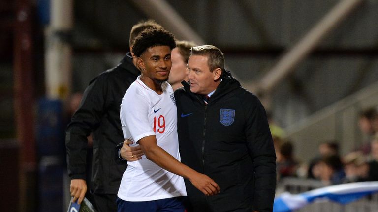 Aidy Boothroyd embraces Reiss Nelson during the England U21s v Scotland U21s game