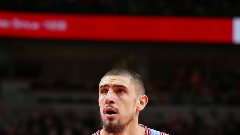 Alex Len #25 of the Atlanta Hawks shoots a free throw during the game against the Chicago Bulls on March 3, 2019 at the United Center in Chicago, Illinois