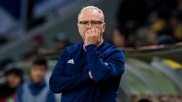 Scotland manager Alex McLeish watches on frustrated.