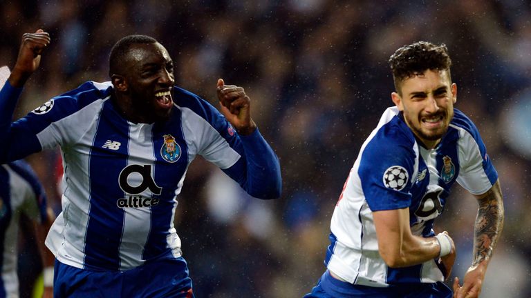 Alex Telles celebrates his extra-time penalty which saw Porto beat Roma