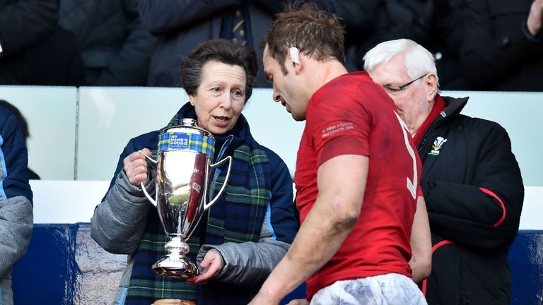 Wales' captain Alun Wyn Jones receives the winner's trophy from Princess Anne.