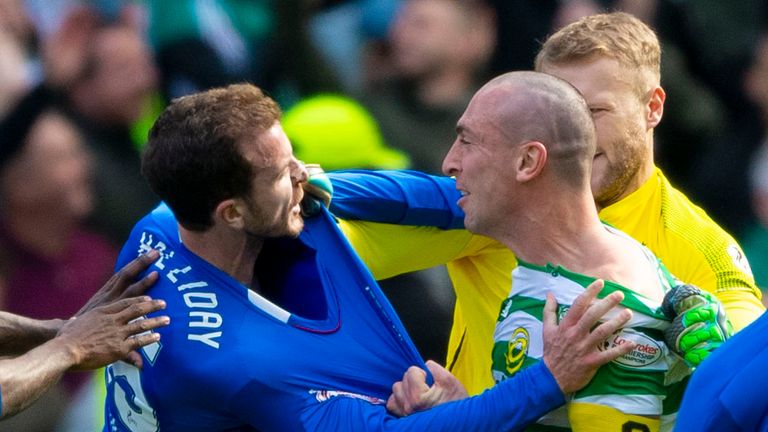 Andy Halliday and Scott Brown clash after full-time of the Old Firm derby