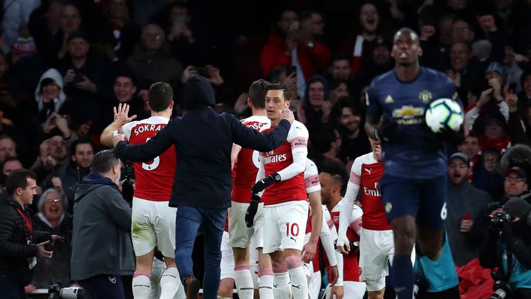 The spectator entered the Emirates pitch after Arsenal's second goal  