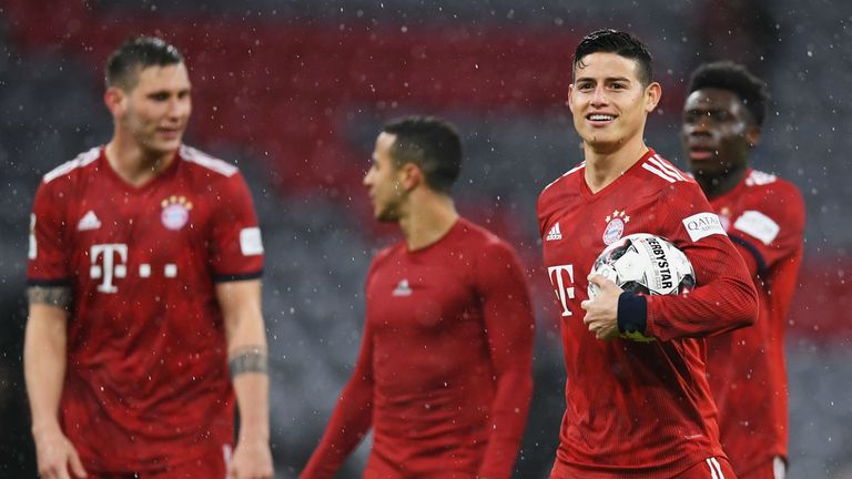 James Rodriguez celebrates his hat-trick for Bayern Munich.
