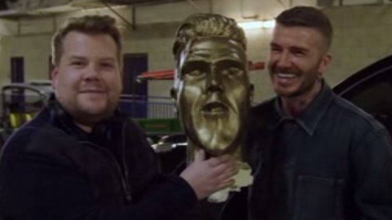 David Beckham is pranked by James Corden with a fake statue.