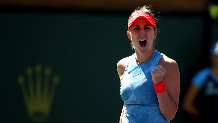 Belinda Bencic of Switzerland celebrates a point against Karolina Pliskova of the Czech Republic during their women's singles quarter final match on day eleven of the BNP Paribas Open at the Indian Wells Tennis Garden on March 14, 2019 in Indian Wells, California. 