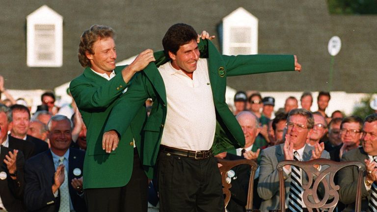 Bernard Langer helps Jose Maria Olazabal into his Green Jacket in 1994