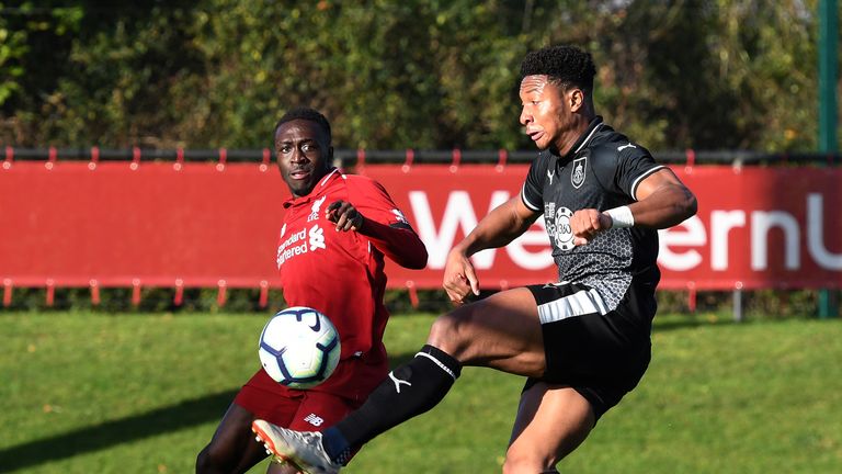 Liverpool 's Bobby Adekanye and Ali Koiki of Burnley in action during the Premier League Cup game at The Kirkby Academy on November 11, 2018