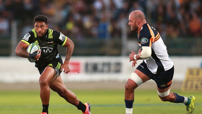 Vince Aso attempts to evade Lachlan McCaffrey during the round three Super Rugby match