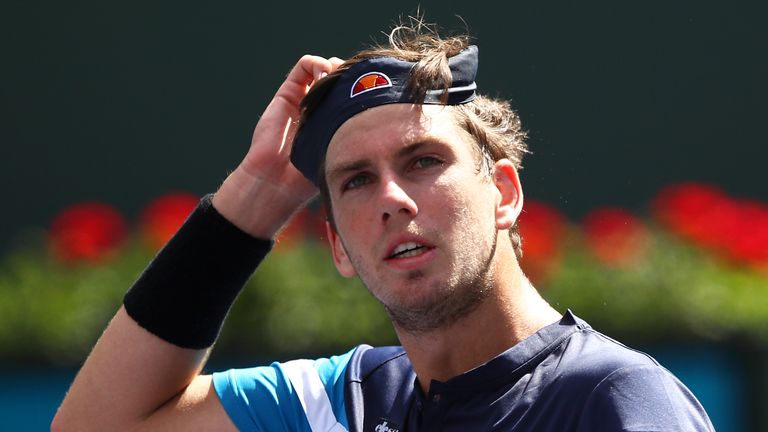 Cameron Norrie of Great Britain shows his frustration after his straight sets defeat 1against Felix Auger-Aliassime of Canada during their men's singles first round match on day four of the BNP Paribas Open at the Indian Wells Tennis Garden on March 07, 2019 in Indian Wells, California