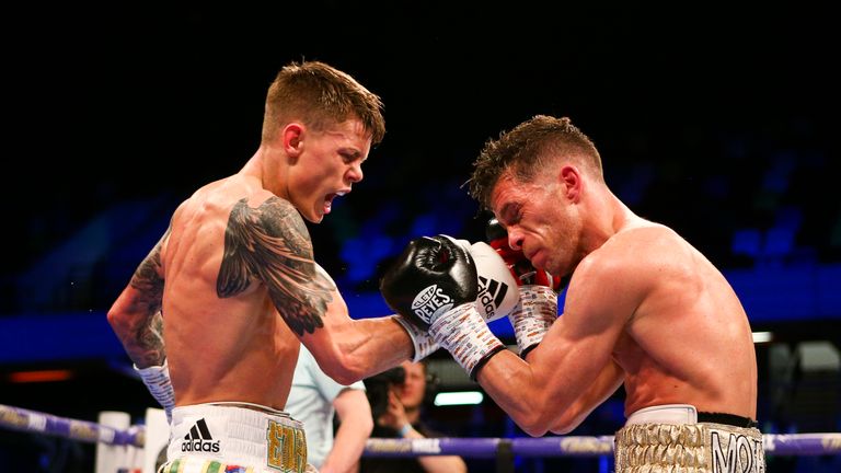 Charlie Edwards lands a right on Angel Moreno during his WBC flyweight title defence
