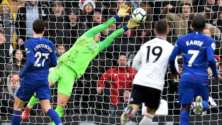Chelsea's Spanish goalkeeper Kepa Arrizabalaga makes a late save during the English Premier League football match between Fulham and Chelsea at Craven Cottage in London on March 3, 2019. - Chelsea won the game 2-1