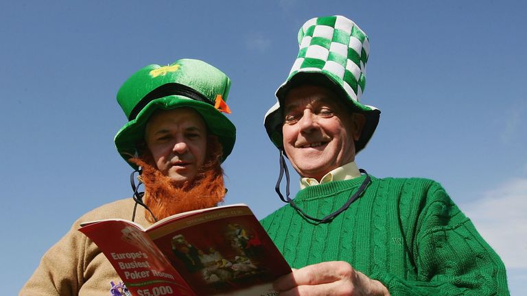 CHELTENHAM, ENGLAND -  MARCH 17:  Irish punters study the form on the third day of the Annual National Hunt Festival at Cheltenham racecourse on March 17, 2005 in Cheltenham, England. (Photo by Mike Hewitt/Getty Images)