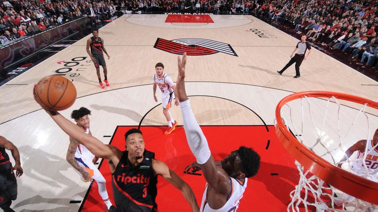 CJ McCollum #3 of the Portland Trail Blazers puts up the shot against the Phoenix Suns on March 9, 2019 at the Moda Center Arena in Portland, Oregon.