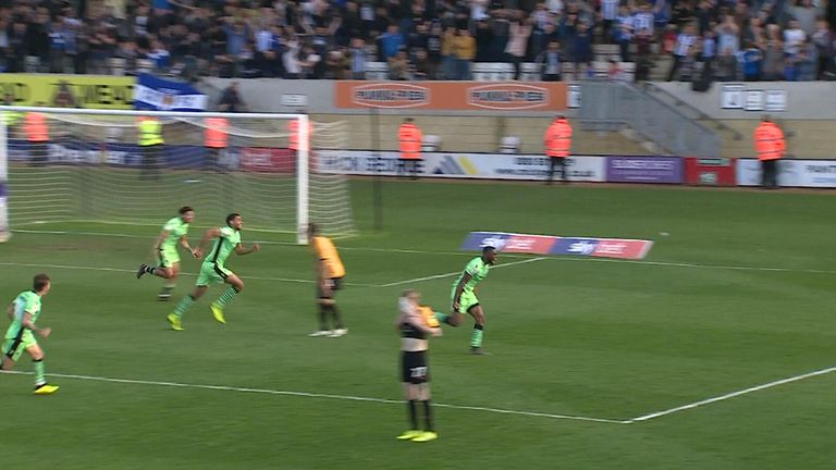 A fabulous strike in the last minute of stoppage time from Kane Vincent-Young secured a precious 1-0 win for play-off chasing Colchester.