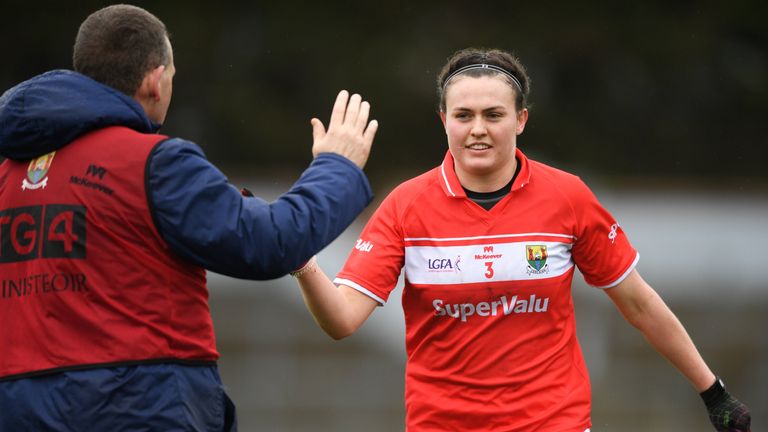 Cork's Hannah Looney celebrates with manager Ephie Fitzgerald