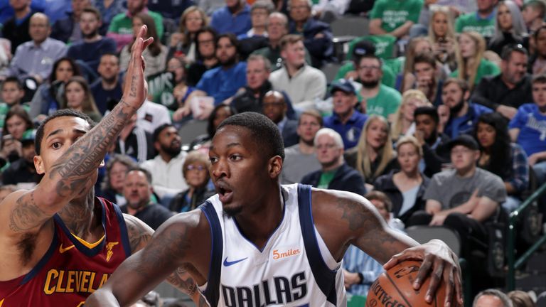 Dorian Finney-Smith #10 of the Dallas Mavericks handles the ball against the Cleveland Cavaliers on March 16, 2019 at the American Airlines Center in Dallas, Texas. 