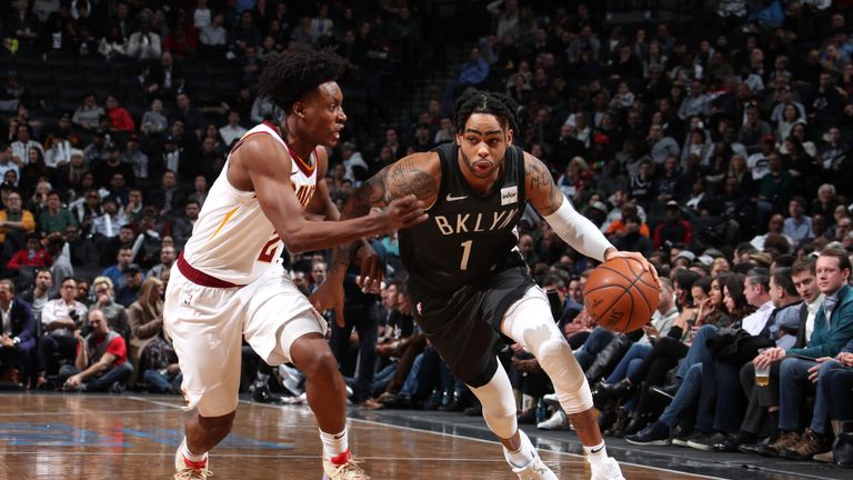 D&#39;Angelo Russell of the Brooklyn Nets drives past Collin Sexton of the Cleveland Cavaliers