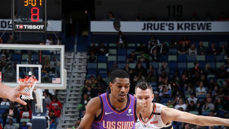 De&#39;Anthony Melton #14 of the Phoenix Suns handles the ball against the New Orleans Pelicans on March 16, 2019 at the Smoothie King Center in New Orleans, Louisiana