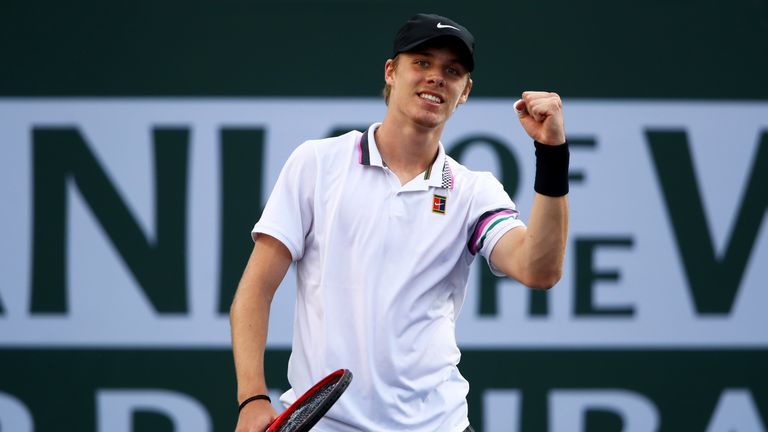 Denis Shapovalov of Canada celebrates match point against Steve Johnson of the United States during their men's singles second round match on day seven of the BNP Paribas Open at the Indian Wells Tennis Garden on March 10, 2019 in Indian Wells, California