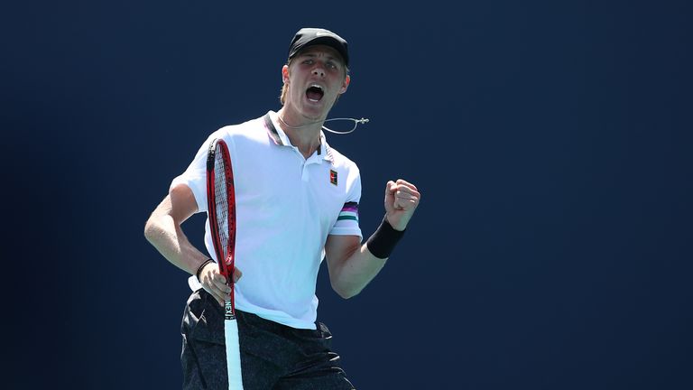 Denis Shapovalov of Canada celebrates against Dan Evans of Great Britain during the Miami Open Tennis on March 23, 2019 in Miami Gardens, Florida