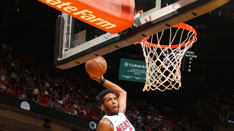 Derrick Jones Jr of the Miami Heat slams a dunk during the game against the Toronto Raptors