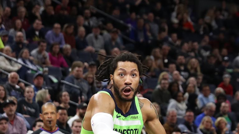 Derrick Rose # 25 de los Minnesota Timberwolves conduce a la canasta contra los Washington Wizards el 9 de marzo de 2019 en Target Center en Minneapolis, Minnesota