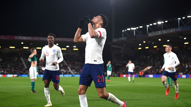 Dominic Solanke of England celebrates after scoring his sides first goal during the International Friendly match between England u21's and Germany u21's at Vitality Stadium on March 26, 2019 in Bournemouth, England. 