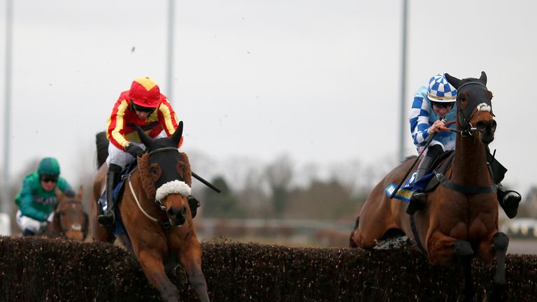 SUNBURY, ENGLAND - FEBRUARY 25:  James Best riding Pilgrims Bay (C, red/yellow) clear the last to win The BetBright Handicap Steeple Chase from Double Shuffle (R) at Kempton Park on February 25, 2017 in Sunbury, England. (Photo by Alan Crowhurst/Getty Images) *** Local Caption *** James Best;Pilgrims Bay 