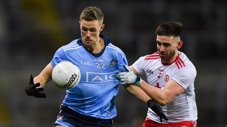 Paul Mannion of Dublin in action against Pádraig Hampsey of Tyrone