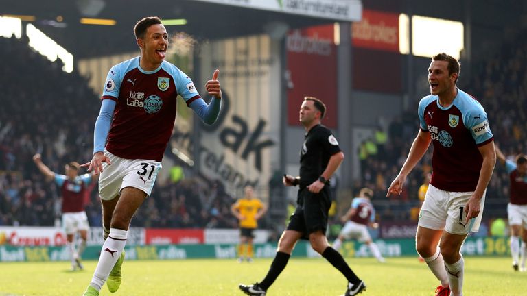 Dwight McNeil celebrates after scoring Burnley's second against Wolves