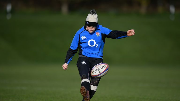 Emily Scarratt practices her kicking during an England training session
