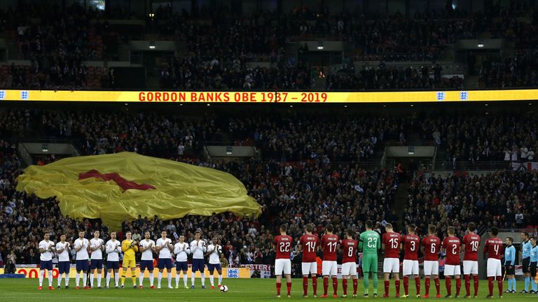 A giant banner depicting his yellow World Cup '1' shirt of Gordon Banks was passed around the crowd 